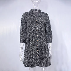 Robe fleurie chic à manches trois-quarts