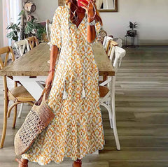 Robe mi-longue bohème chic à col en V et manches trois-quarts