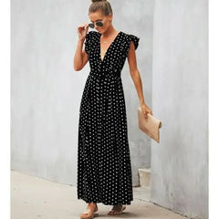 Robe chic à pois avec décolleté en V et manches en forme de pétales 