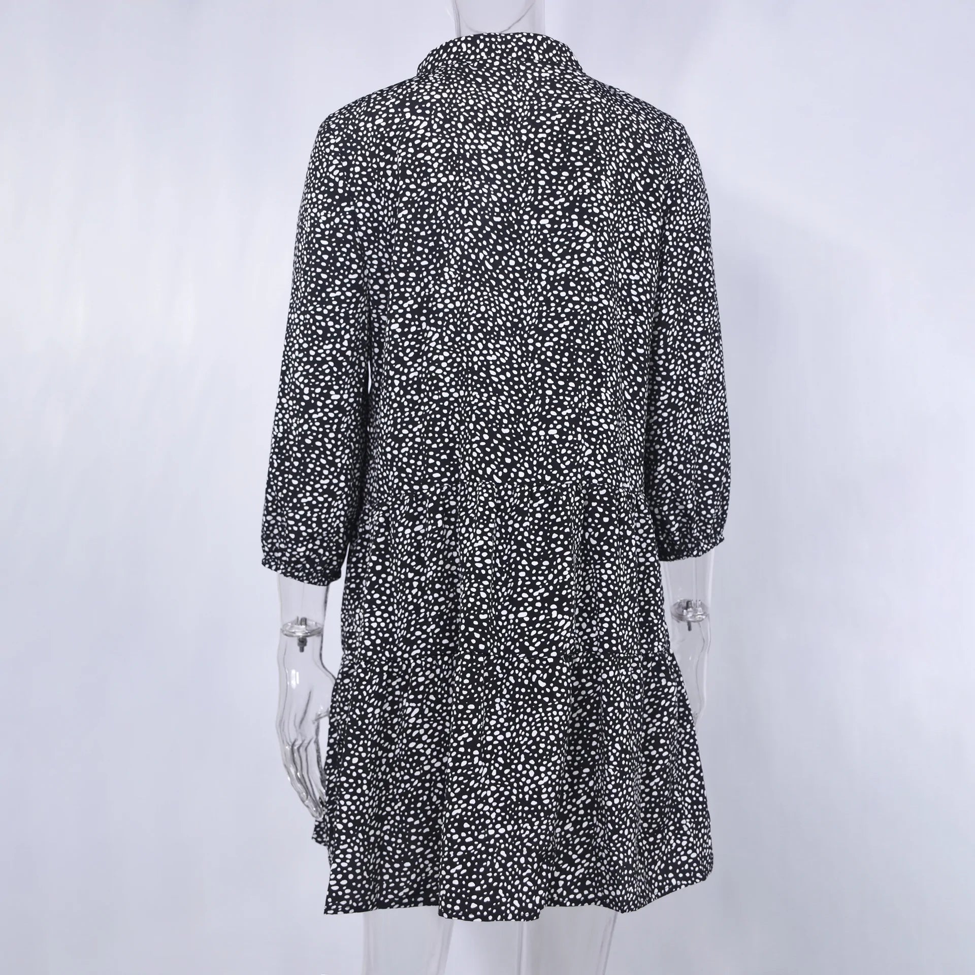 Robe fleurie chic à manches trois-quarts