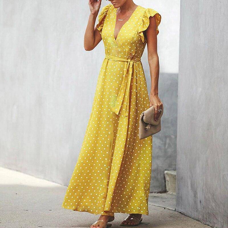 Robe chic à pois avec décolleté en V et manches en forme de pétales 