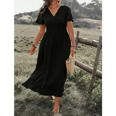 Robe élégante à col en V et manches cloche avec fente latérale