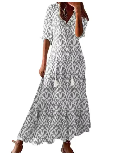 Robe mi-longue bohème chic à col en V et manches trois-quarts